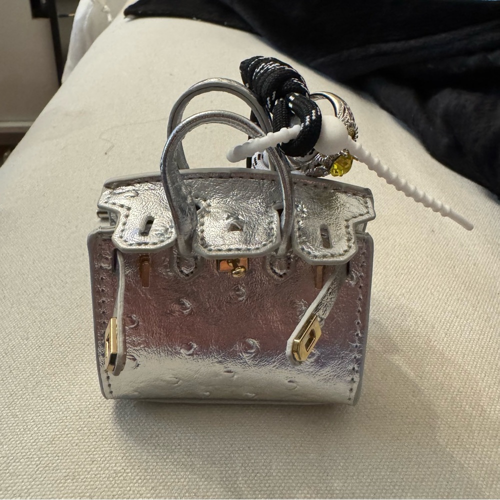 BAG CHARM , IN Silver Mini Bag with Gold Accents. Gorgeous